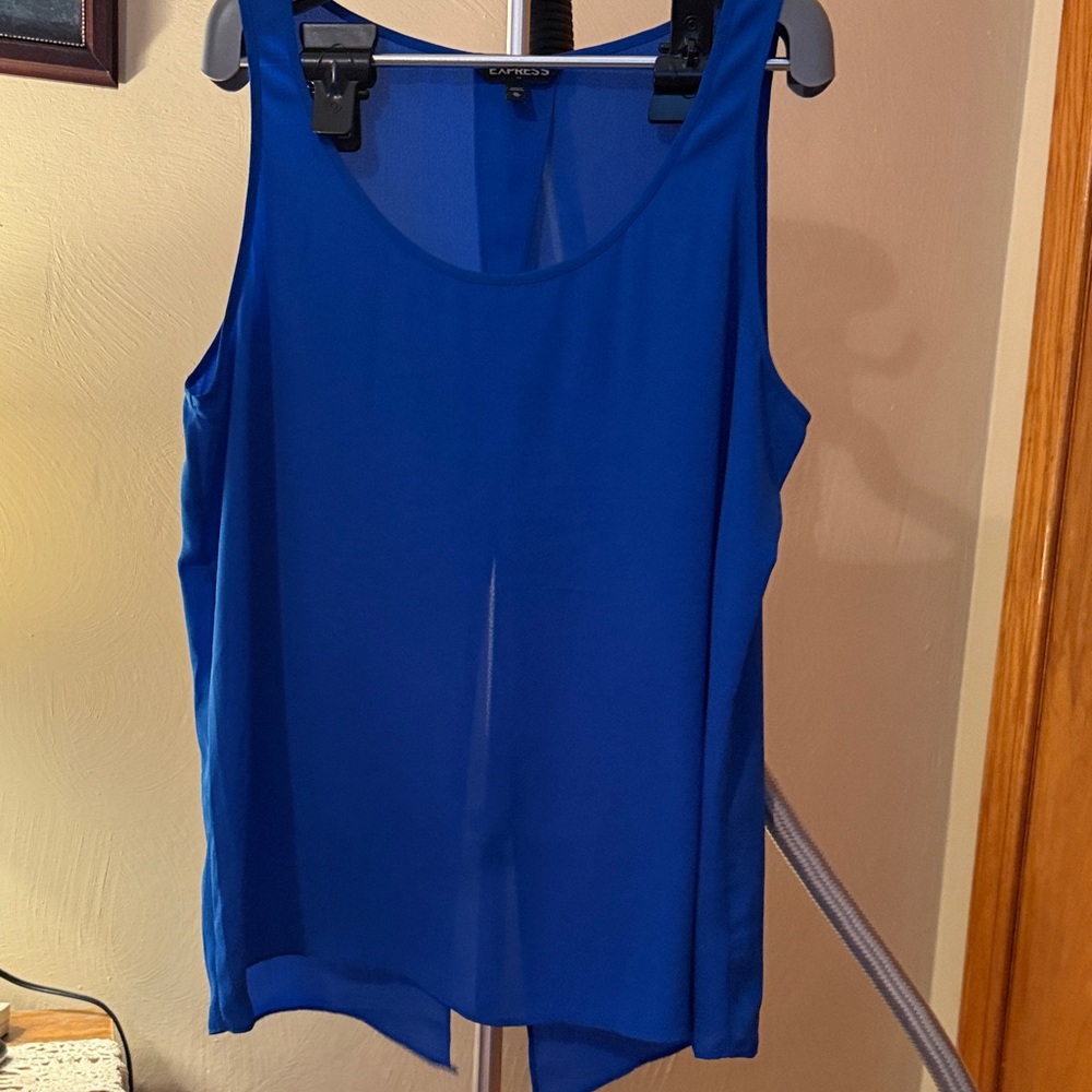 Express size XL. Royal blue sleeveless. Open in back at the bottom. Like new.